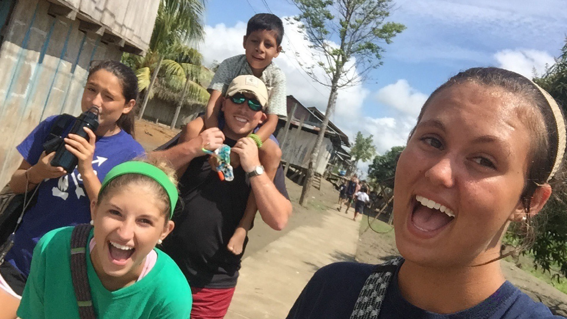 A group of Brookwood Church volunteers smiling together on a Mission Trip